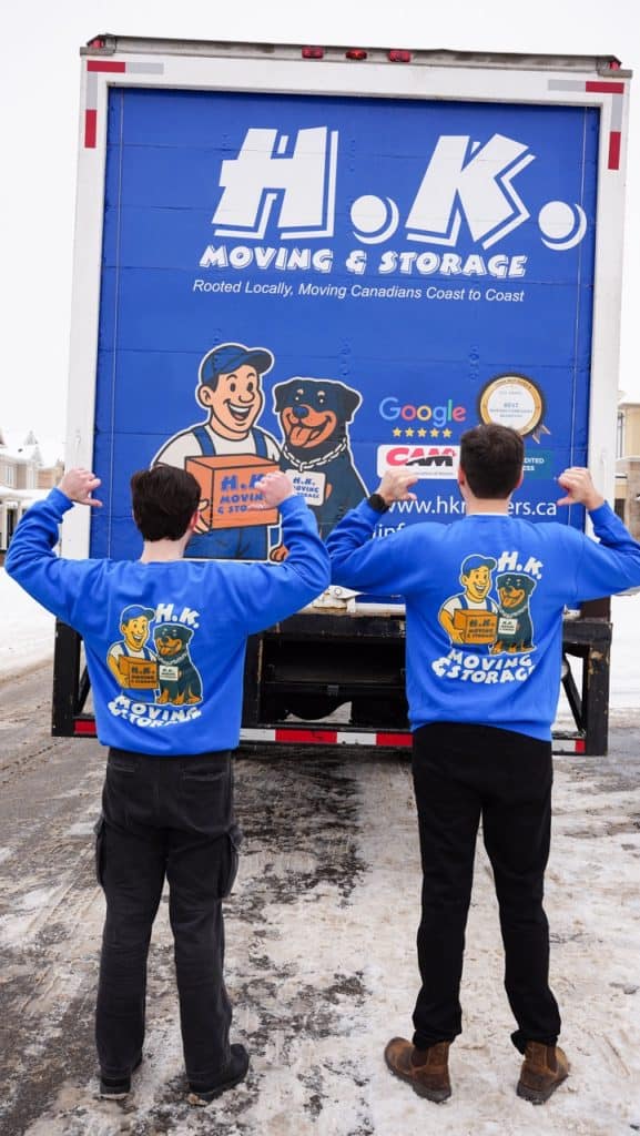 H.K. Moving and Storage workers by company truck