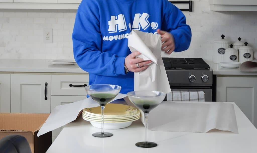 Professional packing service in Toronto with HK Movers, ensuring safe and efficient packing for full-service moves, room by room.